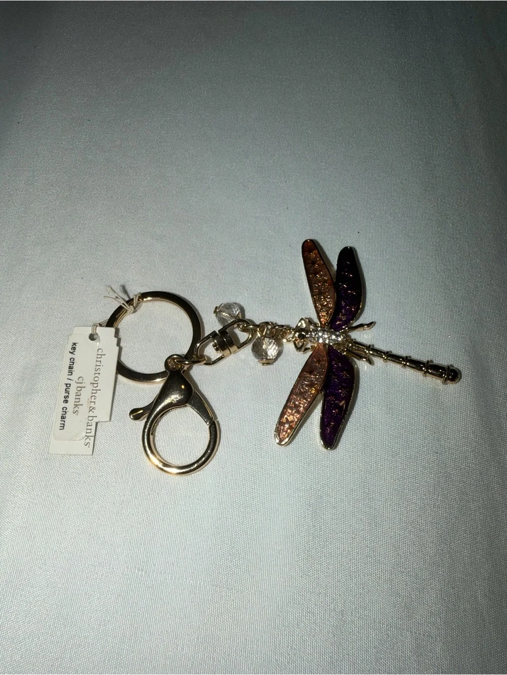 Christopher & Banks Gold Dragonfly Keychain with Purple and Gold Tone Wings
